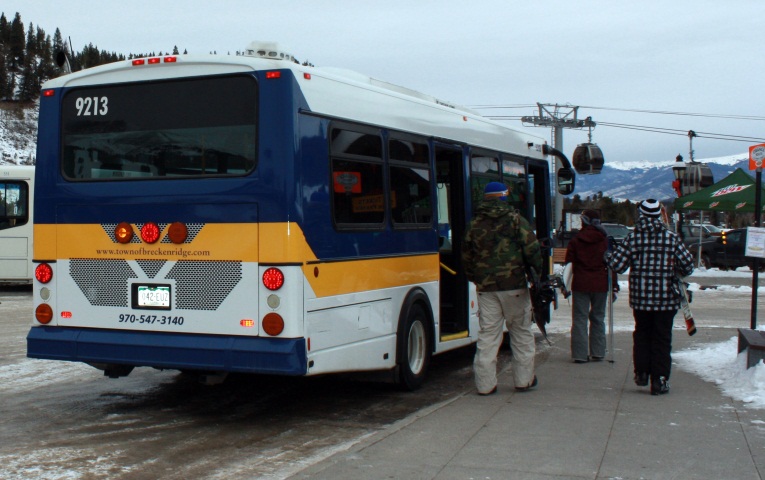 Passengers loading bus